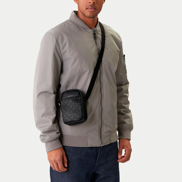 bolsa-transversal-emblem-slim-reporter