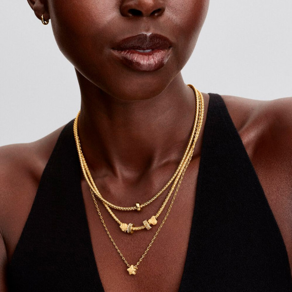 breloque-mini-coeur-texturee-en-or-14-carats-764000c00