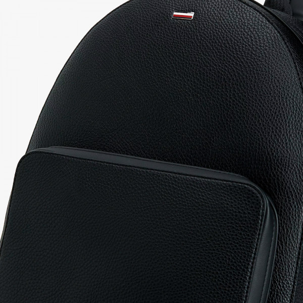 backpack-with-badge-and-distinctive-ribbon